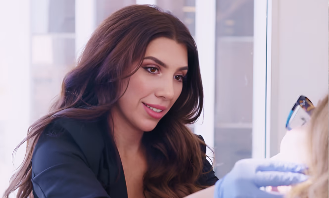 Dr. Vida shaping porcelain veneers chairside using her signature biomimetic technique